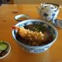 A typical Japanese meal pickled vegetables fried shrimp in broth with noodles and tea. Photo by JL, (c) ASC