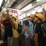 Elementary school students riding a train Tokyo. Photo by JL, (c) ASC