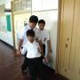 Junior high school students in the school hallway. Photo by JL, (c) ASC