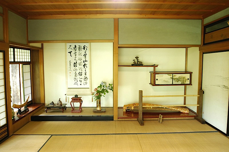 View of a tokonoma alcove with decorative scrolls and objects on display in a private home. Photo by JL, (c) ASC